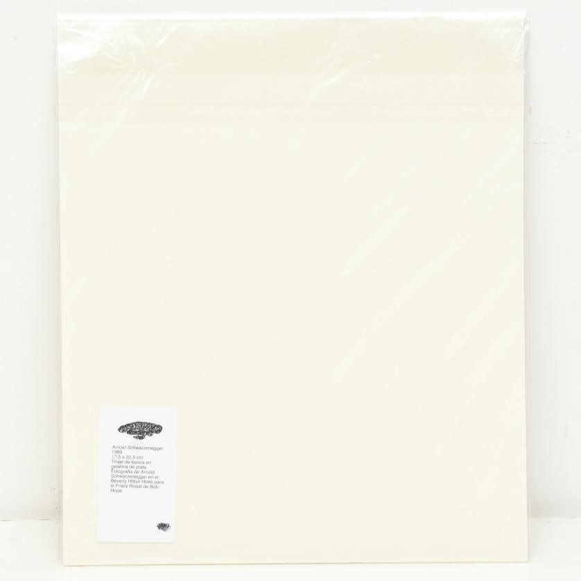 Arnold Schwarzenegger. 1989.: Vintage silver gelatin print. Photograph of Arnold Schwarzenegger at the Beverly Hilton Hotel for Bob Hope's Friars Roast. 22.5 x 17.5 cm (photo).
