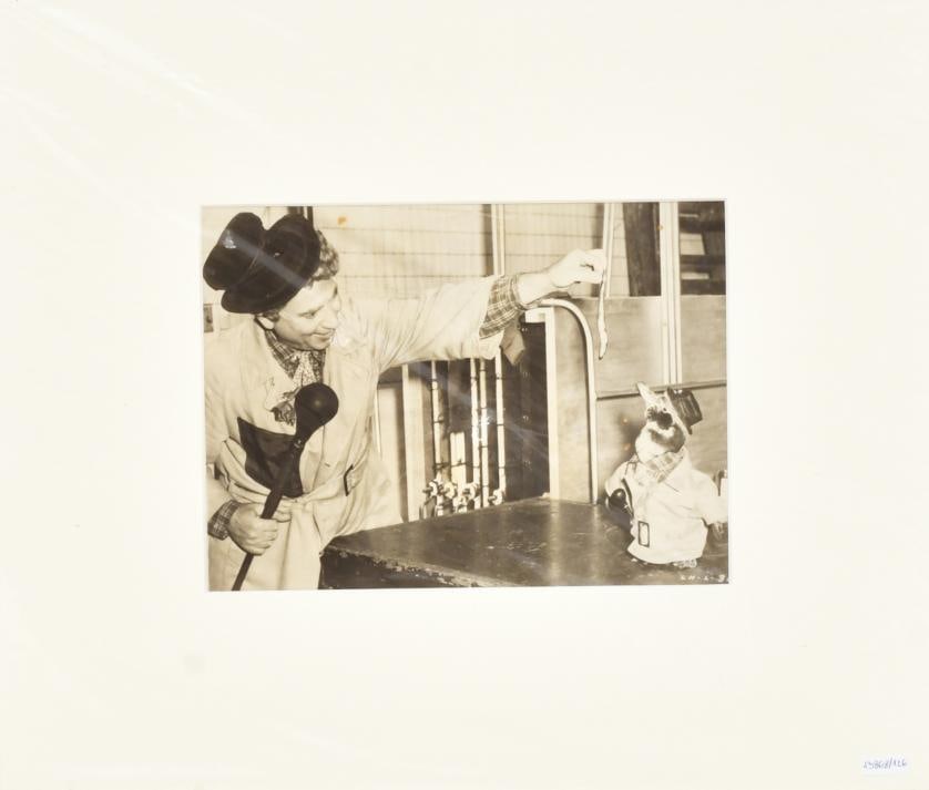 Harpo Marx. 1949.: Vintage silver gelatin print. Harpo Marx in the film ‘Love Happy', directed by David Miller. 18 x 23 cm (photo).