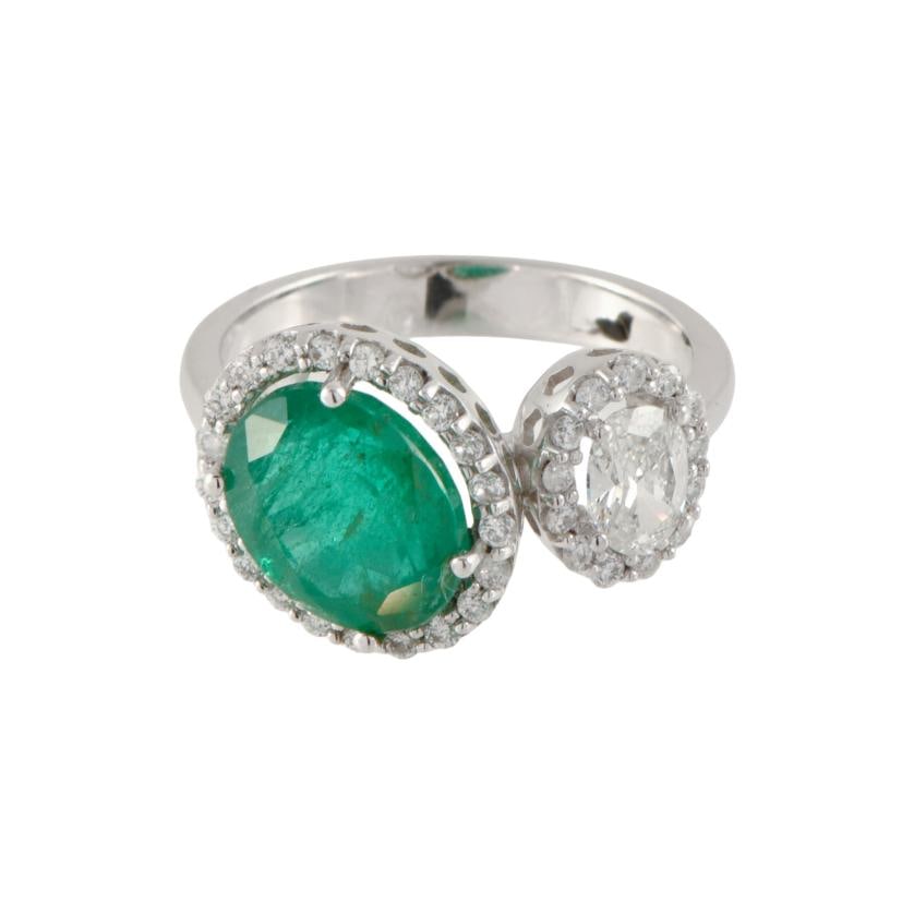 You and me ring with emerald and diamonds. (1 of 2)