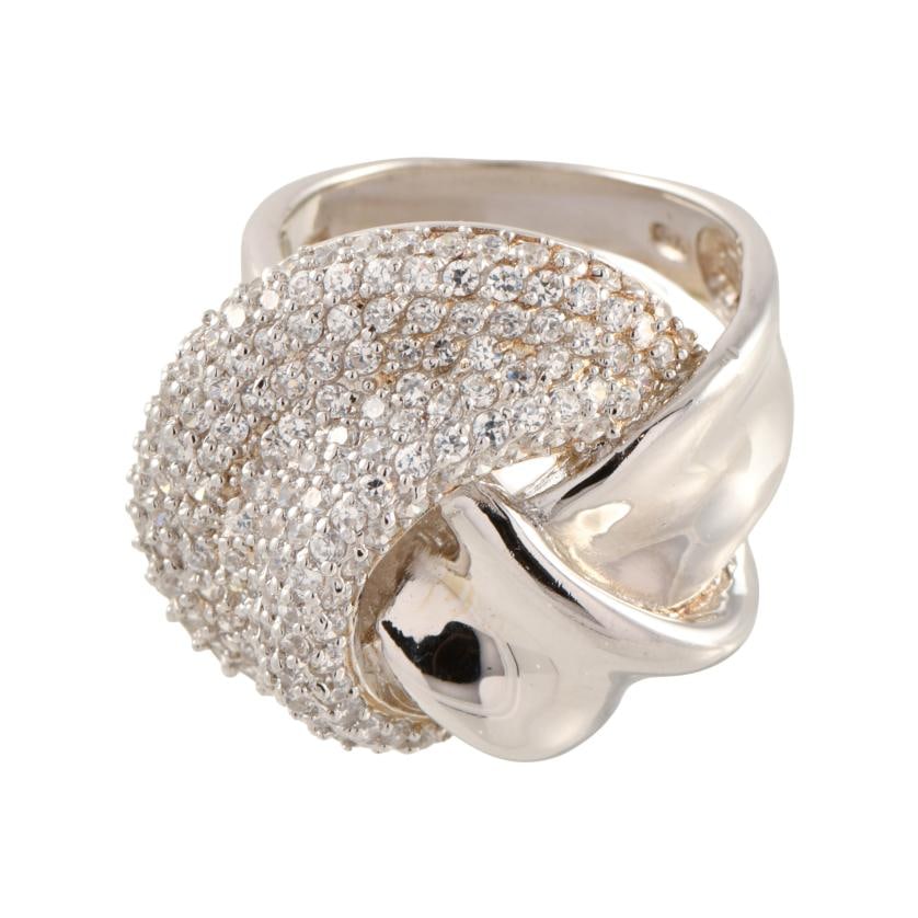 Large bow-shaped ring with zircons pavé.: 925 silver. Brilliant cut zircons pavé. Size: 17/57.