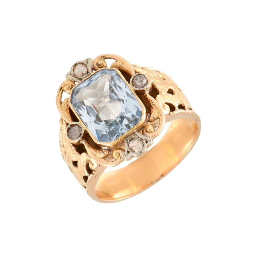 Ring from the 1920's with synthetic aquamarine and diamonds.: 18 kt yellow gold. Old cut diamonds.Size 16/56.