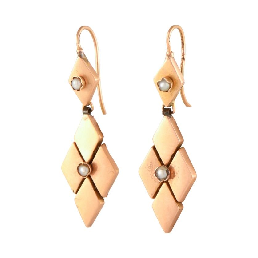 Long diamond-shaped earrings with pearls. (1 of 1)