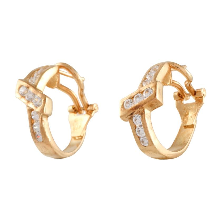 Hoop earrings with zircons.: Over-gilded 925 silver. Omega clasp.