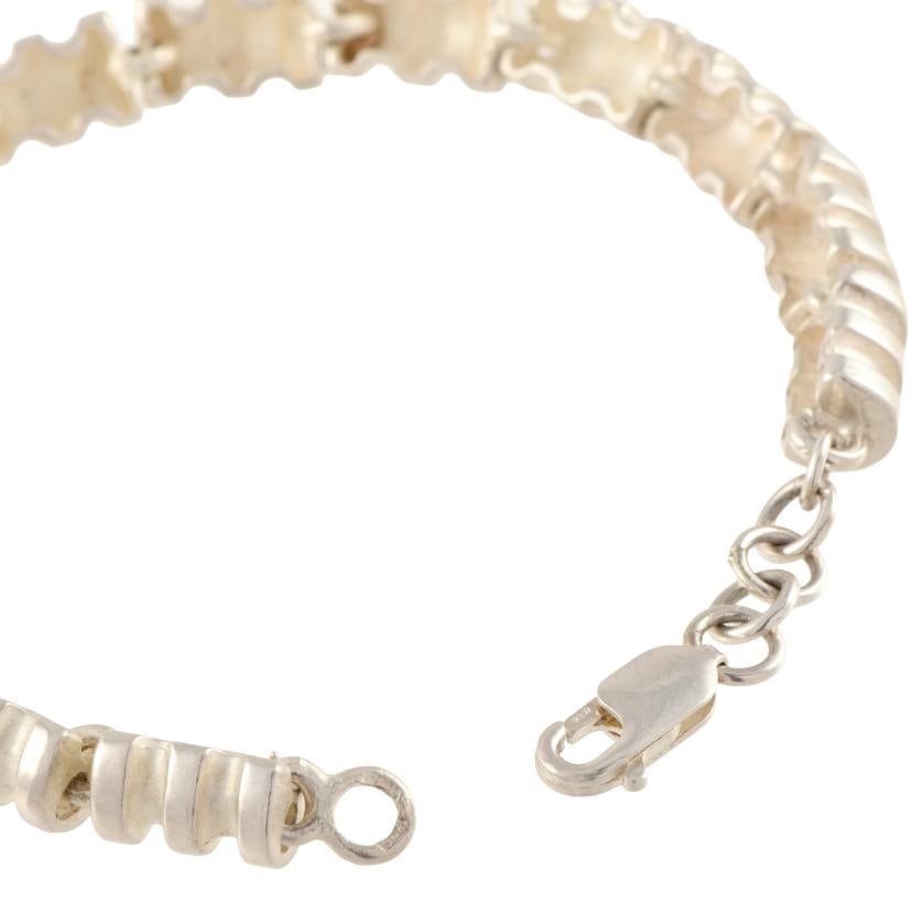 Bracelet with cylindrical beads.: 925 silver. Length: 21 cm. Carabiner clasp.