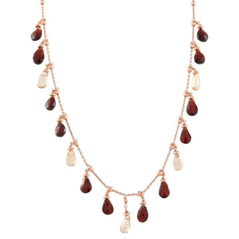 Necklace with marron beads.: 925 rose silver. With a links chain and carabiner clasp. Length when closed: 25 cm.