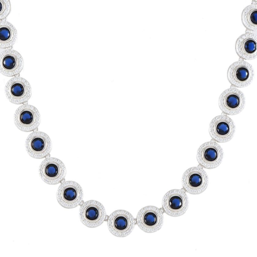 Choker with blue quartzes and zircons rosettes.: 925 silver and brilliant cut blue quartzes. Length when open: 43 cm. Carabiner clasp.