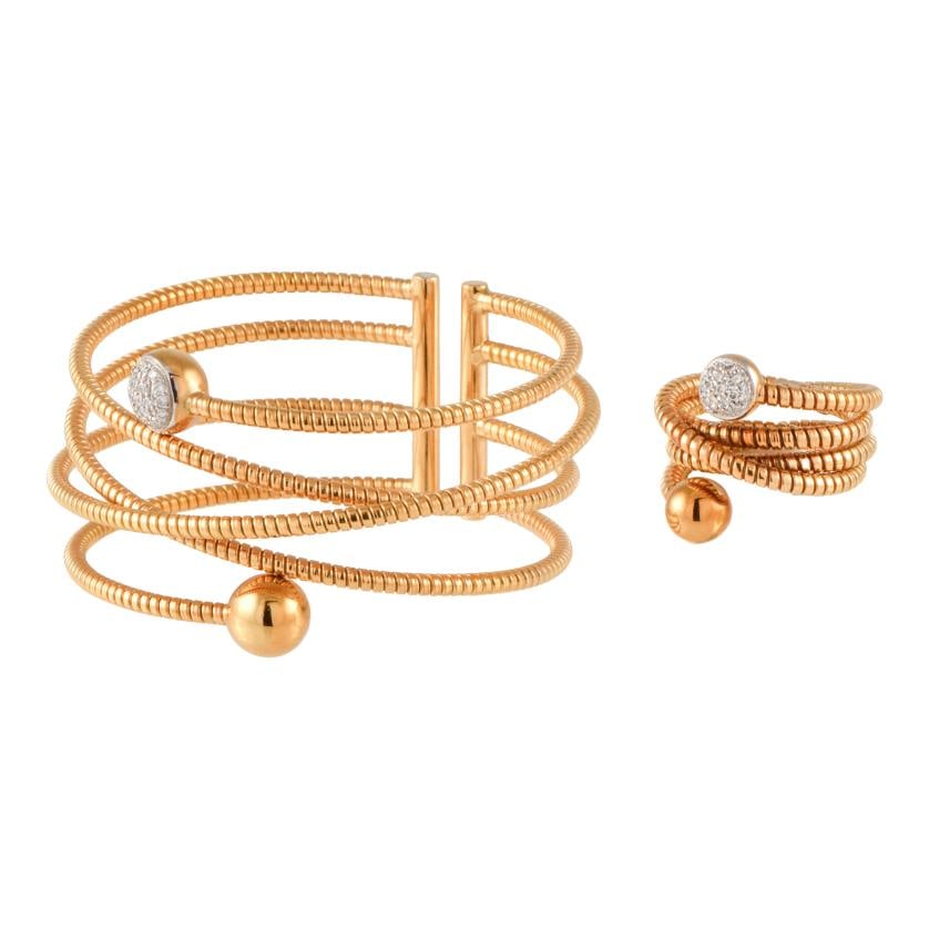 Spiral-shaped tubogas bracelet and ring set. (1 of 1)