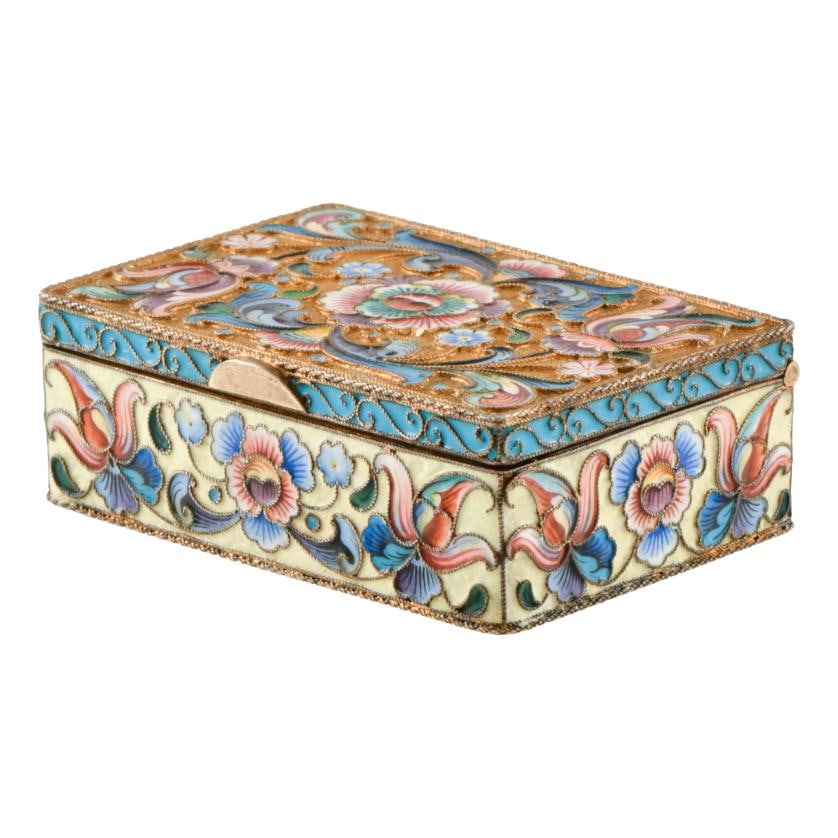 Box, 19th century.: Gold-plated and enamelled silver. Hallmarks on the base indicating the region and the silversmith. Probably from Moscow. 2.5 x 6.5 x 4.5 cm.