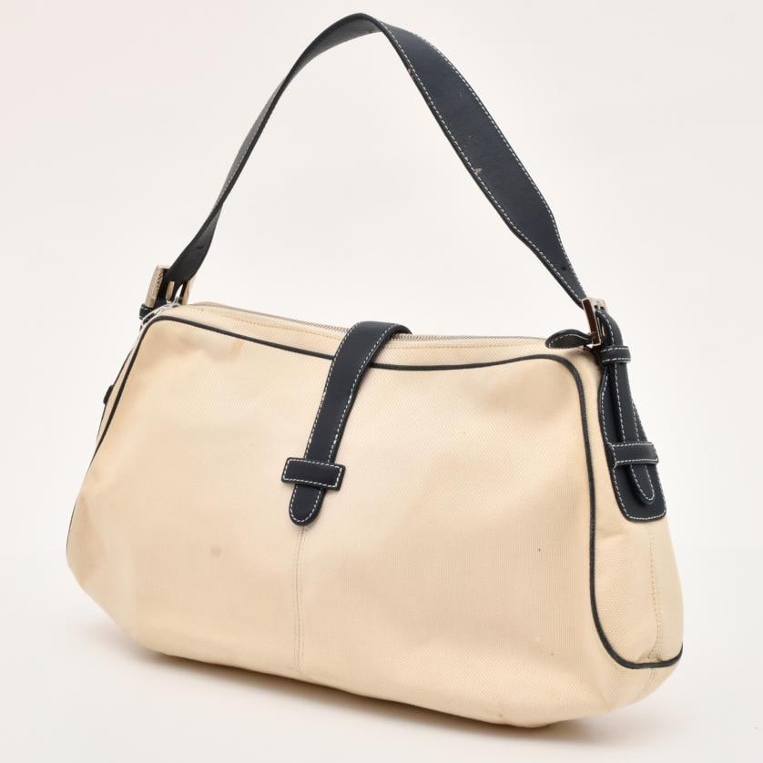 LOEWE. Bag.: Beige canvas, navy blue leather and silvery metal details. Slight wear and tear. 21 x 42 cm approx.