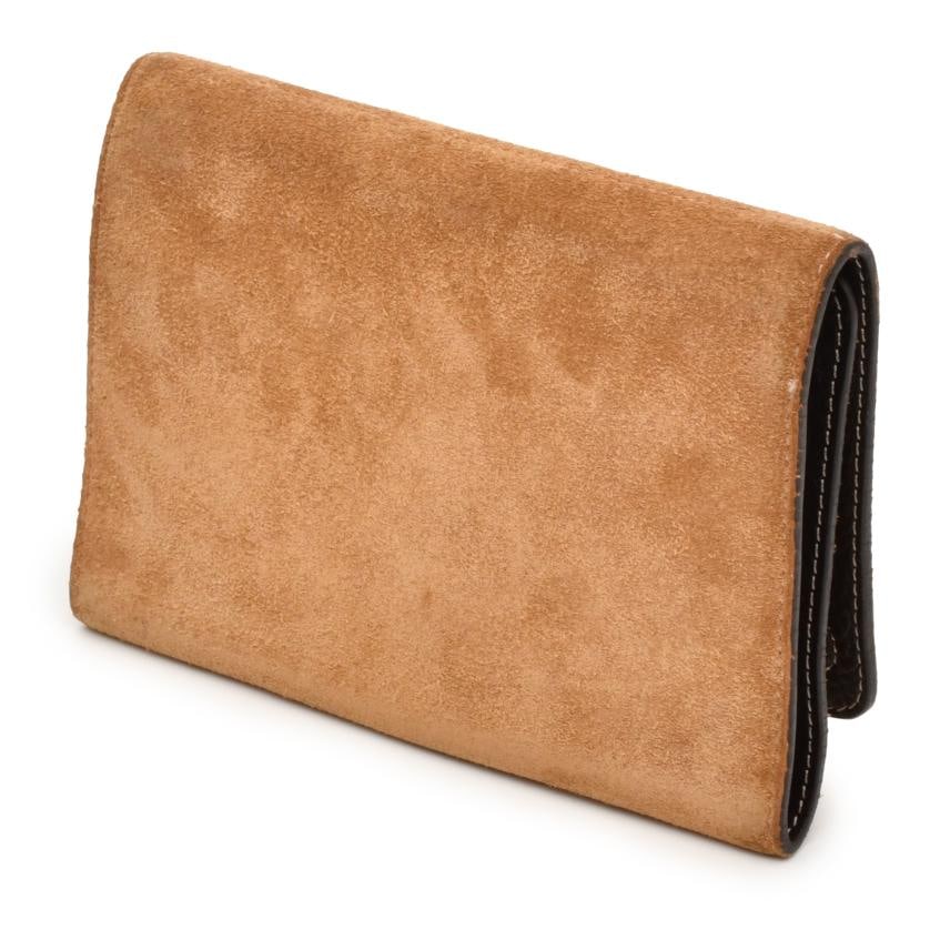 Wallet-jewellery box.: Camel-coloured suede.Wear and tear.With box. 11.5 x 16 cm.