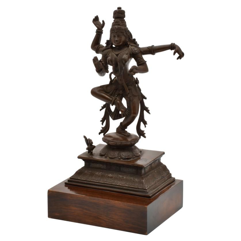 Figure of Godess Kali.: Bronze with marble base.Minor flaws.34 x 18 x 15 cm.
