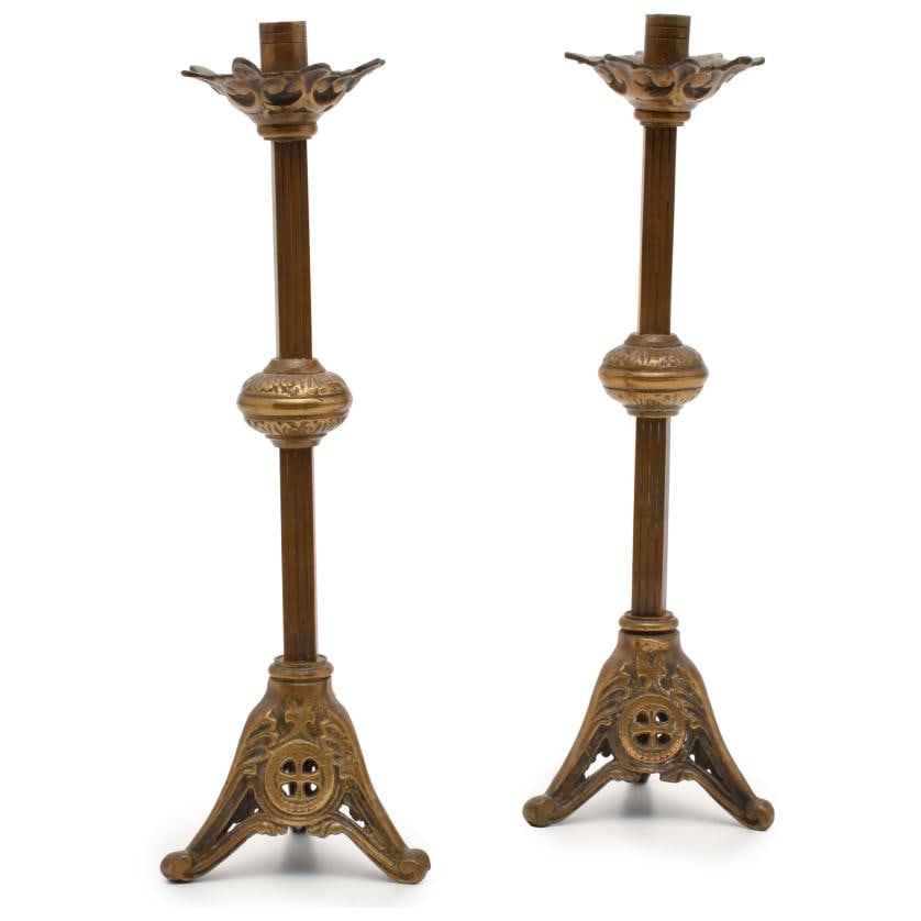 Pair of candlesticks.: Bronse. Decorated with Christian patterns. Minor flaws. 36.5 x 11 cm diam. approx.