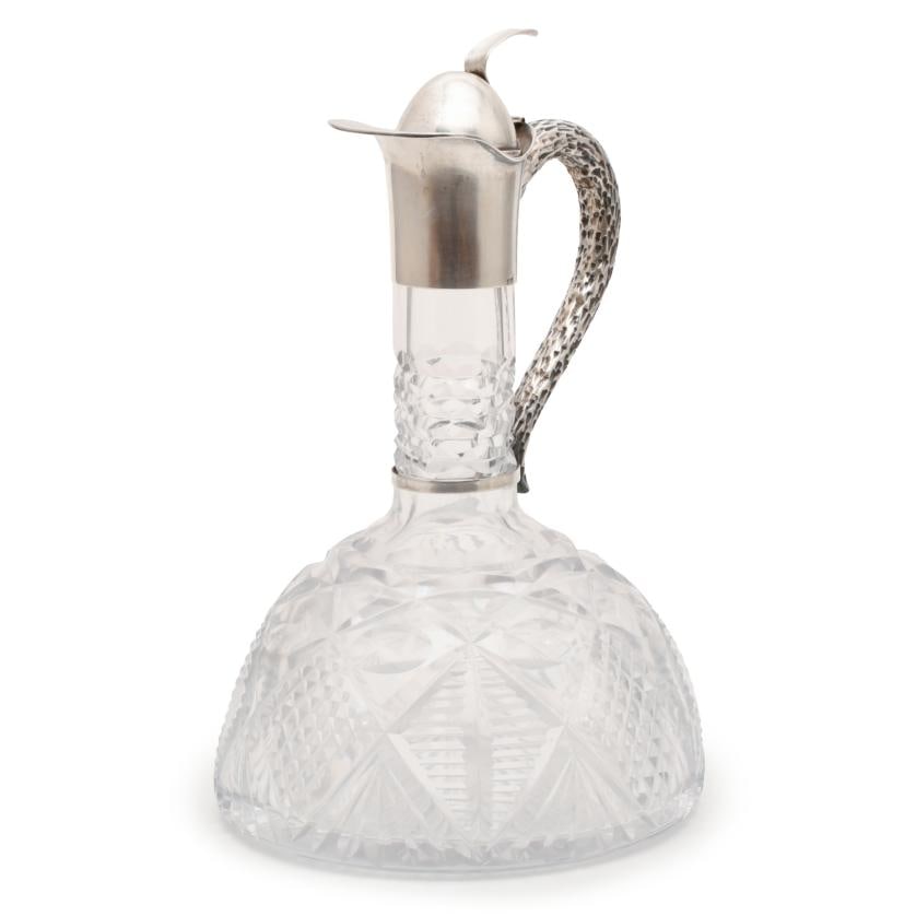 Jug.: Silver and glass. Minor flaws. 30 x 18.5 cm diam.