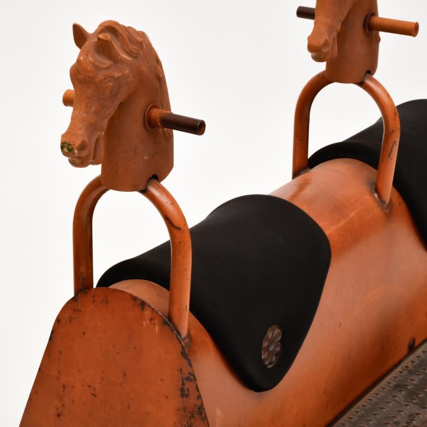 Rocking horses, circa 1930.: Wood and painted metal. Slight wear and tear. 98 x 198 x 38 cm approx.