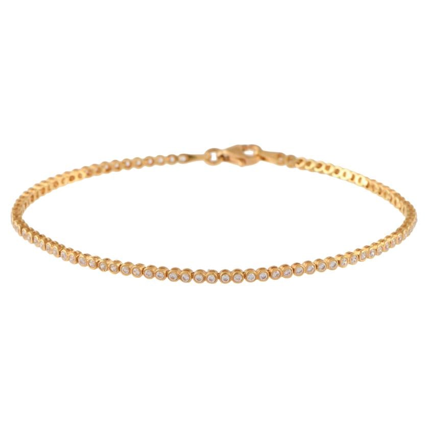Rivière bracelet with zircons.: 18kt white gold and brilliant cut zircons.Carabiner clasp.Length: 19 cm.Weight: 4.6 gr