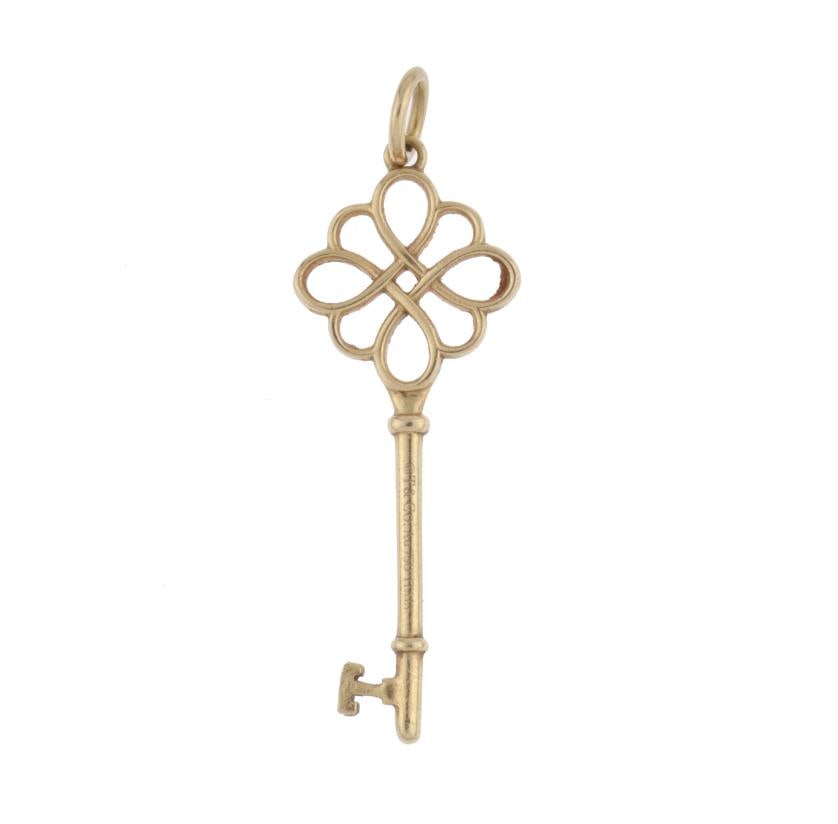 TIFFANY & CO. Key-shaped pendant.: 18 kt yellow gold.Brand hallmark.47 mm Weight: 3.6 gr.