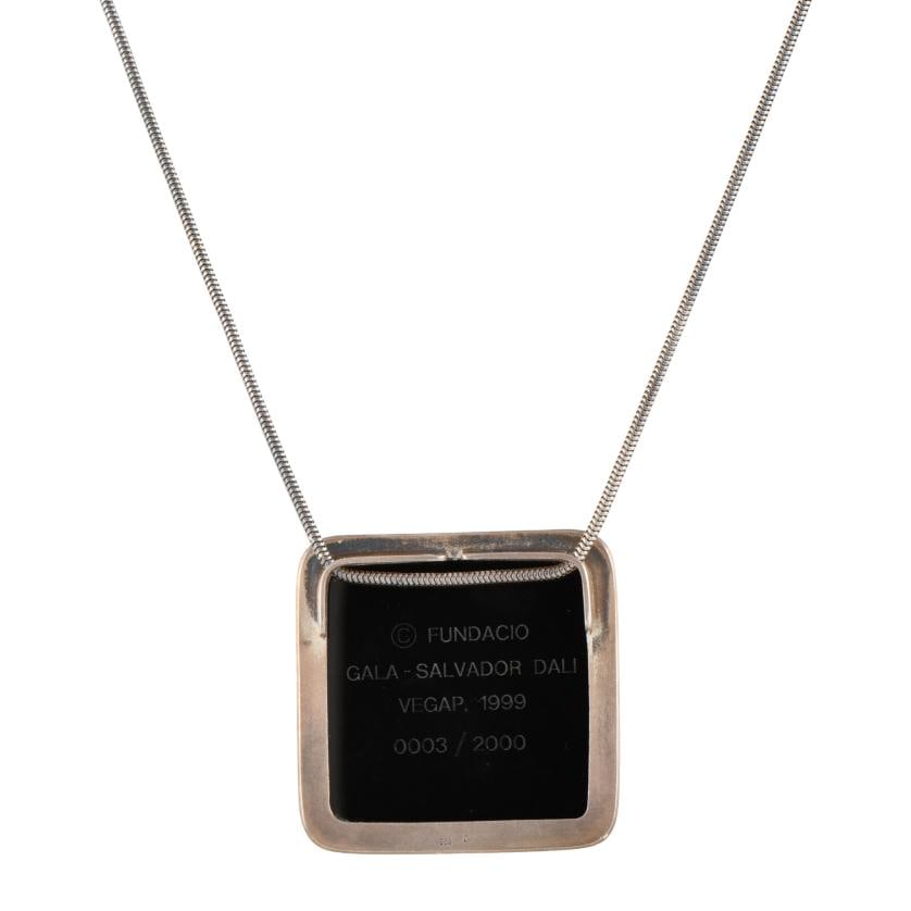 SALVADOR DAL?. Cameo. 'Dalí levantando la piel del mar Mediterráneo para mostrar a Gala el: Tubogas chain and silver setting. Porcelain.3/2000