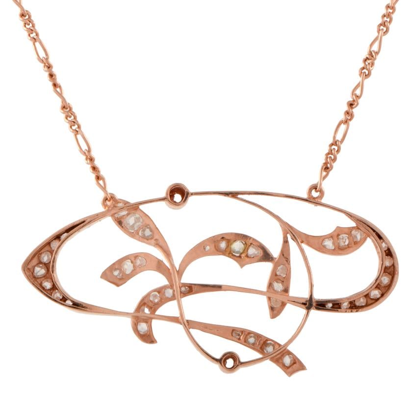 Modernist necklace with pendant.: 18kt rose gold, and old and transition cut diamonds.Links chain with carabiner clasp.Length when closed: 21 cm.Weight: 8.5 gr.