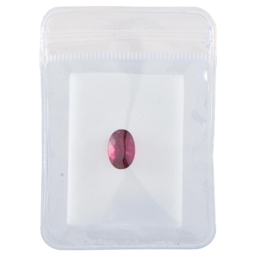 Unmounted rubelite tourmaline.: Oval cut, 3.1ct.Brazil.
