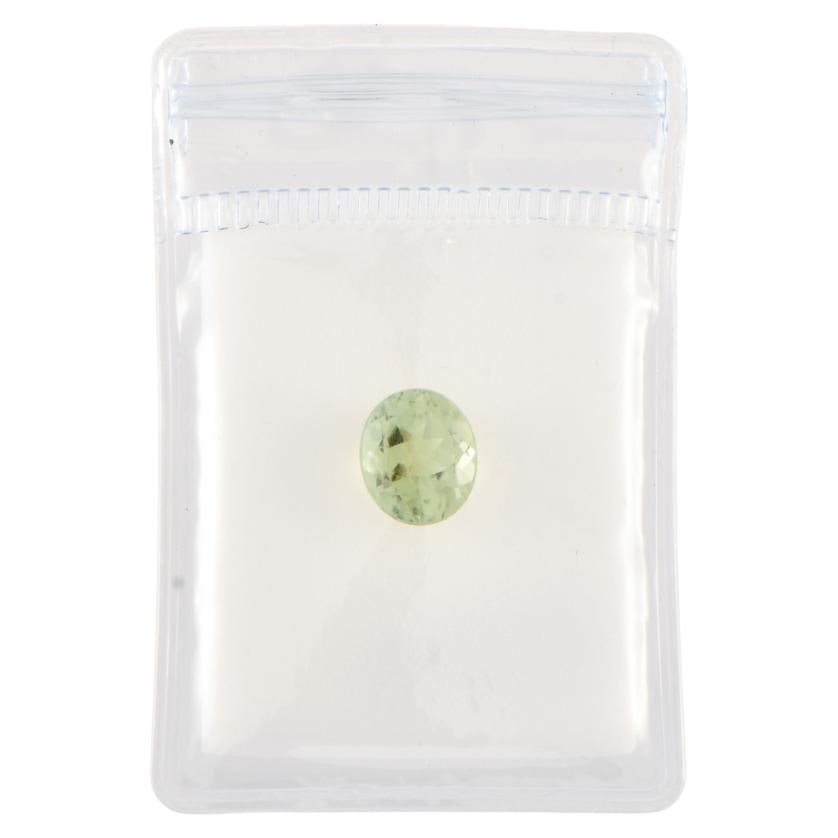 Unmounted olivine tourmaline.: Oval cut, 3.4 ct.Brazil.
