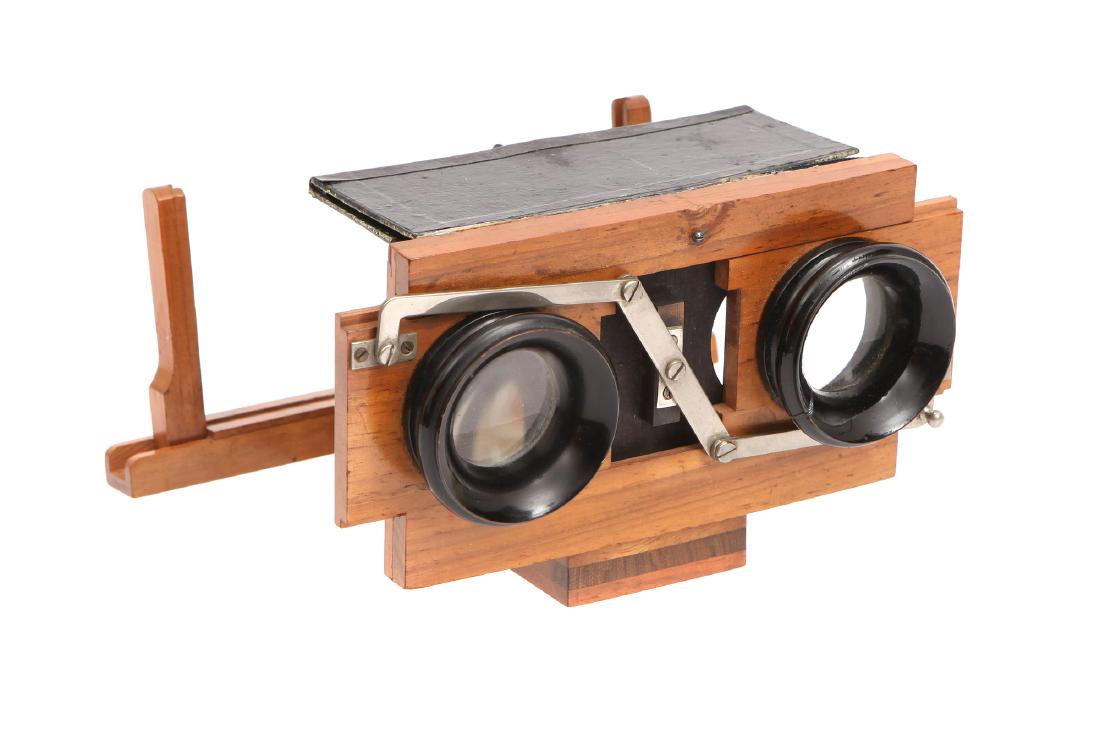 A Folding Stereo Viewer,: German(?), c.1900, unsigned of folding form with rack and pinion focusing