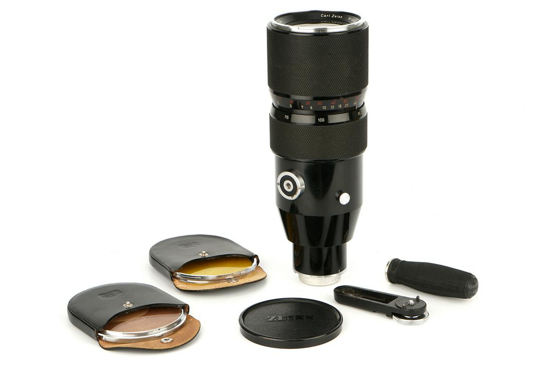 A Carl Zeiss Vario-Sonnar f/4 85-250mm Lens,: Contarex, black, serial no. 4542349, body, VG-E, elements, VG, some haze to rear element, with support mount, grip, filters (2) and lens hood, in maker's fittd case; Only 581 produced.