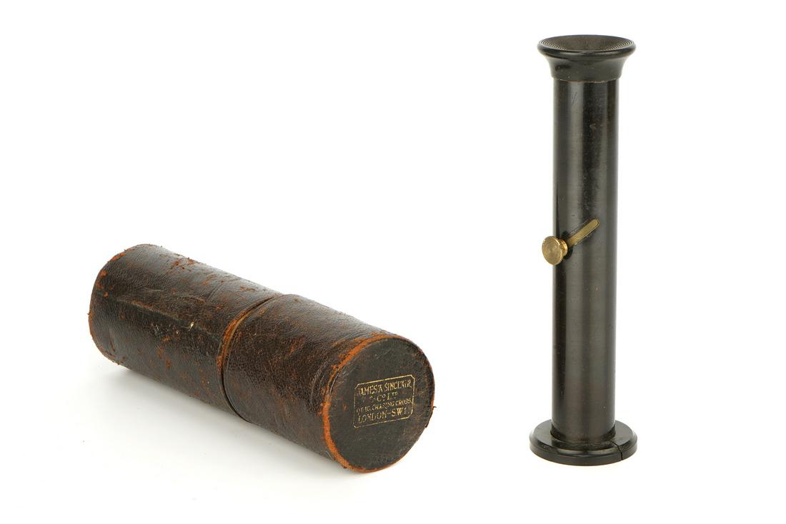 A James A. Sinclair Focus Finder,: for ground glass screens, marked '9-10 Chring Cross, London. S.W.1', in maker's tube.