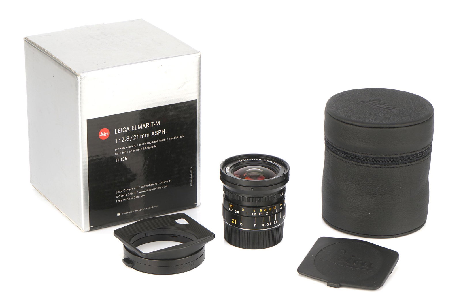 A Leitz Elmarit-M ASPH. f/2.8 21mm Lens,: A Leitz Elmarit-M ASPH. f/2.8 21mm Lens, 2003, E55, black, serial no. 3946909, body, E, elements, E, complete with lens hood, caps and soft pouch, in maker's box