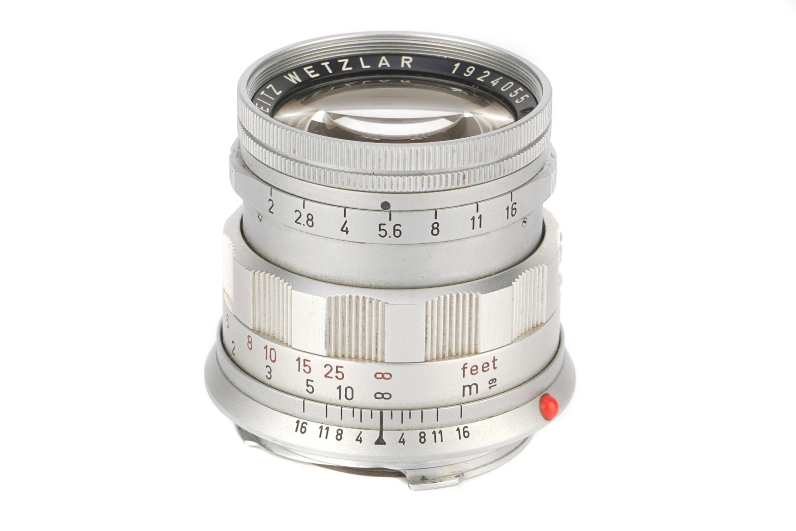A Leitz Summicron f/2 50mm Lens,: A Leitz Summicron f/2 50mm Lens, 1962, rigid, chrome, serial no. 1924055, body, VG, elements, G-VG, some light cleaning marks to front element and light internal marks, in maker's bubble Note: Focus s