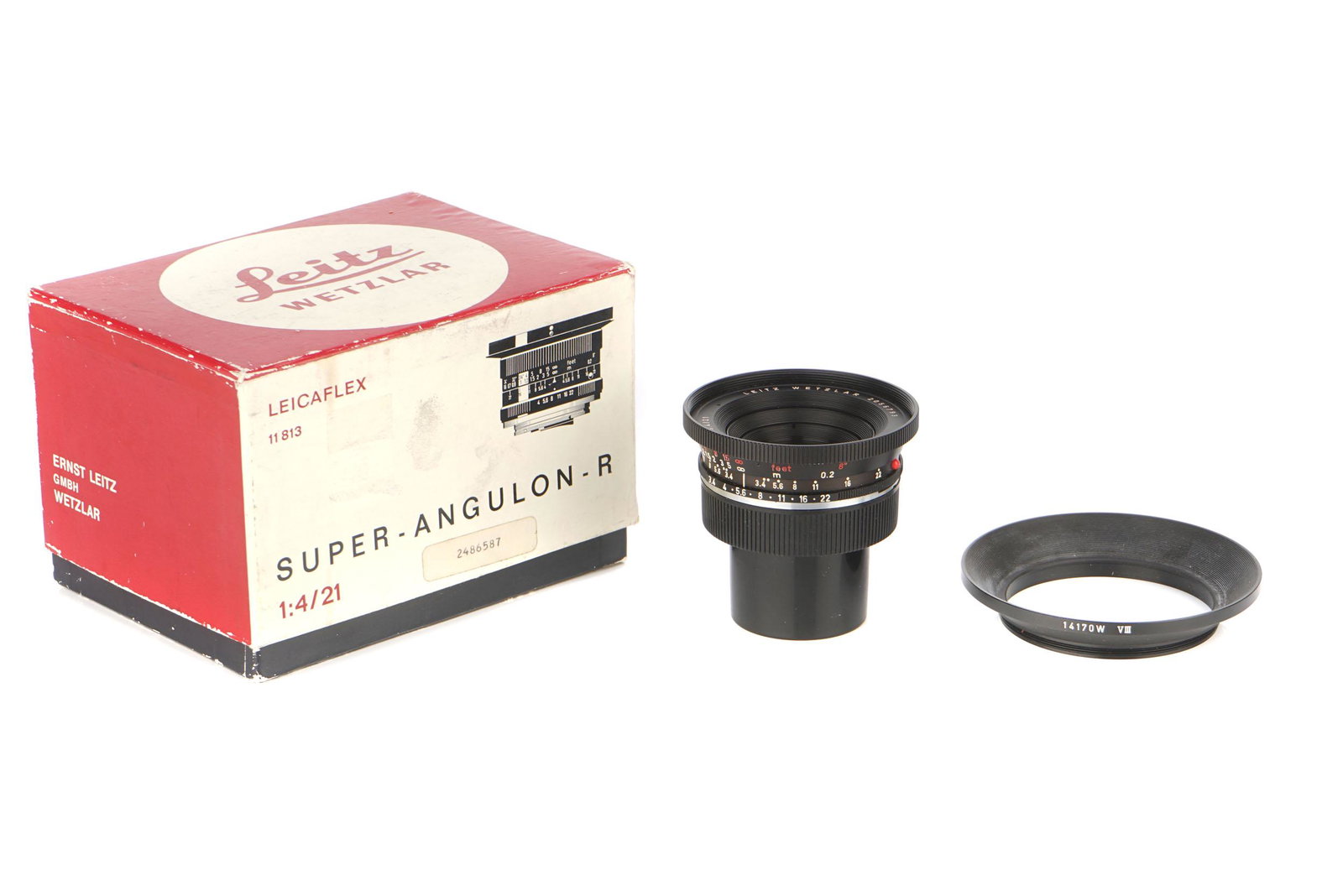 A Leitz Super-Angulon-R f/3.4 21mm Lens,: A Leitz Super-Angulon-R f/3.4 21mm Lens, 1964, Leicaflex, black, serial no. 2056793, body, VG, elements, VG, some internal haze, complete with lens hood and caps, in (incorrect) maker's box Note: VAT 