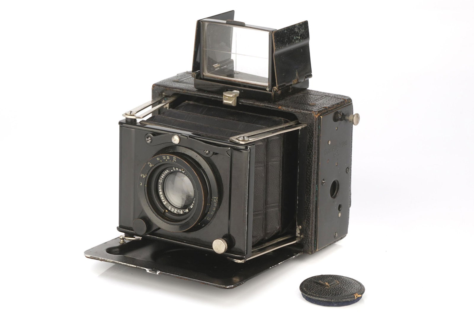 An Ernemann Miniature Klapp 4.5x6cm Camera,: An Ernemann Miniature Klapp 4.5x6cm Camera, 1913-20, black, serial no. 754707, with Ernemann Ernotar f/4.5 75mm lens, serial no. 98265, body, G-VG, shutter not working, lens, G, some internal haze Not