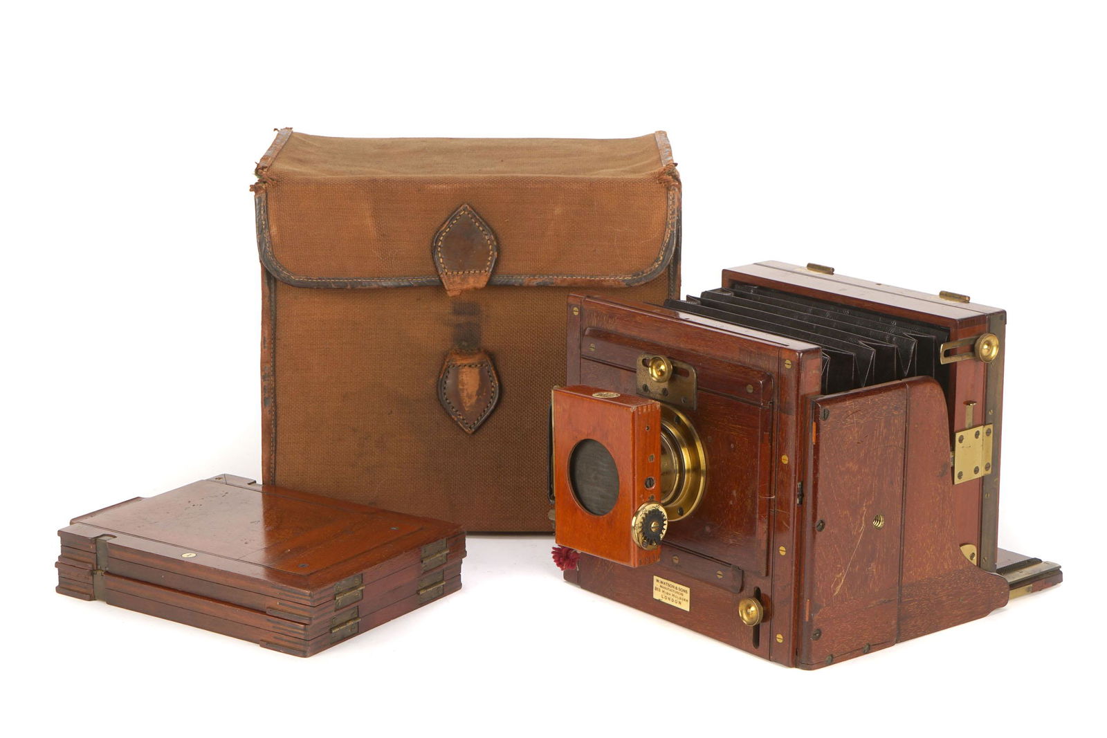 A W. Watson & Son Half Plate Mahogany Tailboard Camera,: A W. Watson & Son Half Plate Mahogany Tailboard Camera, 1885-1890, serial no. 6908, with Ross Rapid Symmetrical 8x5 brass lens, serial no. 88489, body, VG, lens, VG, some very light internal haze, com