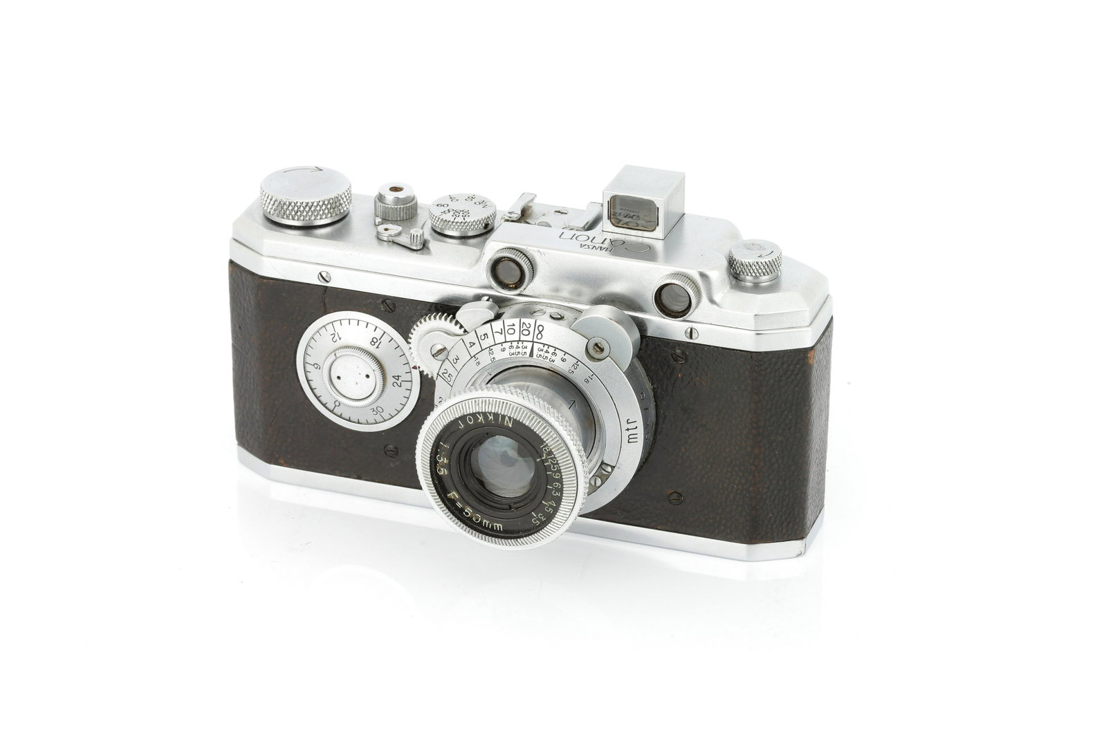 A Canon Hansa Original Rangefinder Camera,: 1936-37, chrome, serial no. 625, with Nikkor f/3.5 50mm lens, body, VG, shutter working, some splits to vulcanite, lens, VG, some light internal haze Refrence: This exact camera (No.625) is featured o