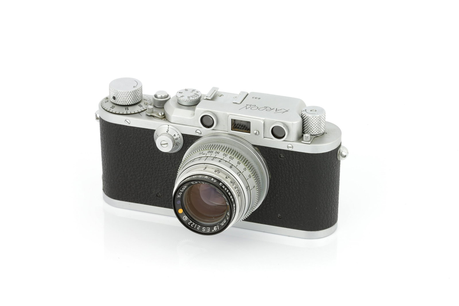 A Premier Instruments Kardon Civilian Rangefinder: 1945, chrome, serial no. 693, with Kodak Ektar f/2 47mm lens, chrome, serial no. ES2122, body, VG, shutter working, lens, VG, some very light cleaning marks Note: Lot imported under Temporary Admissio