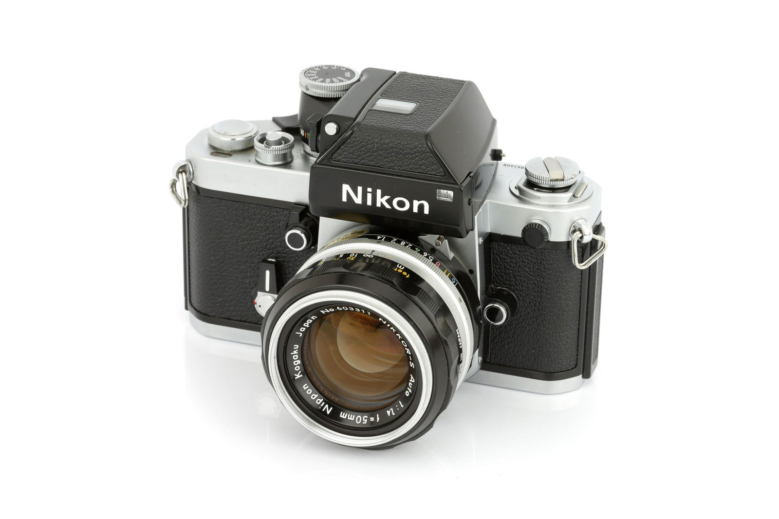 A Nikon F2 Photomic SLR Camera,: 1976, chrome, serial no. 7841408, with Nikkor-S f/1.4 50mm lens, black, serial no. 603311, body, VG, shutter working, lens, E, both in maker's boxes