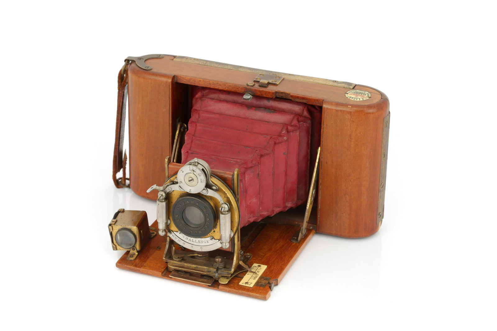 A J. Lizars Tropical Challenge Dayspool Camera,: 1905, 9x12cm, teak, with Lizar's Challenge lens, body, G, lens, G-VG, shutter working Note: Lot imported under Temporary Admission. 5% UK import VAT will be charged on the â€˜hammerâ€™ and 20