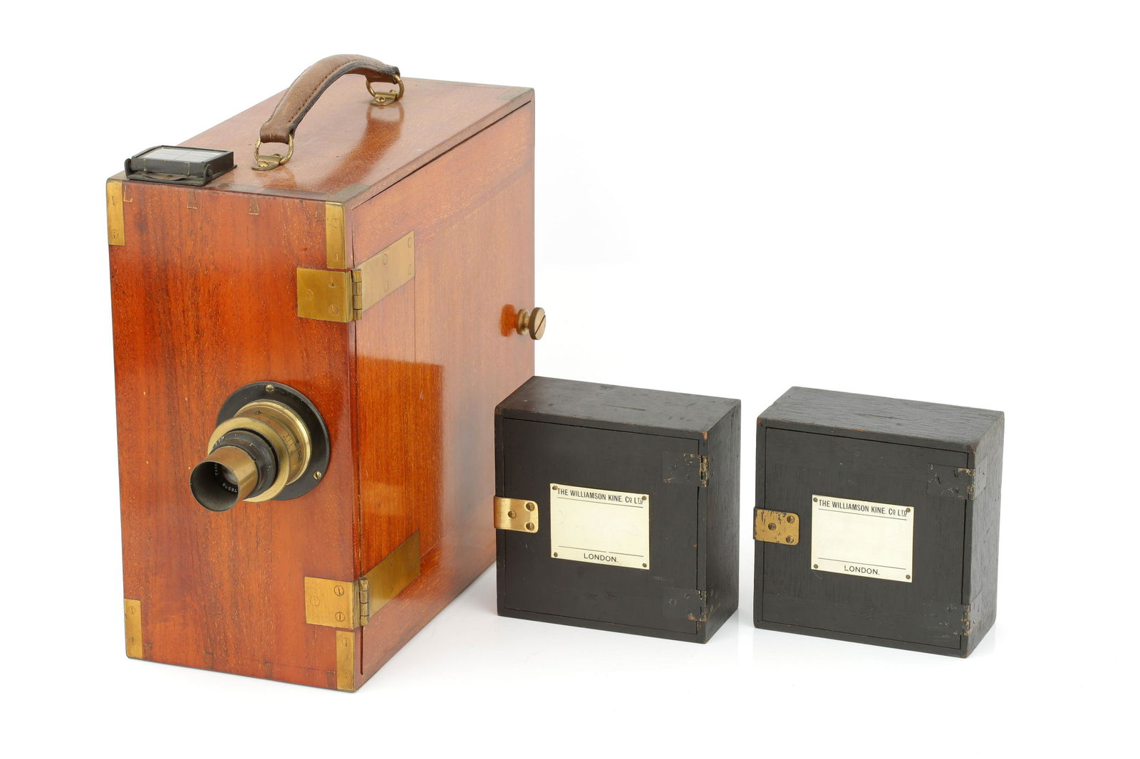 A Williamson Kinematographic 35mm Cine Camera,: 1908, serial no. 142, with Carl Zeiss Jena Tessar f/3.5 50mm lens, bass, serial no. 178578, body, VG-E, mechanism working, lens, G-VG, some internal haze, complete with four magazines Note: Lot import