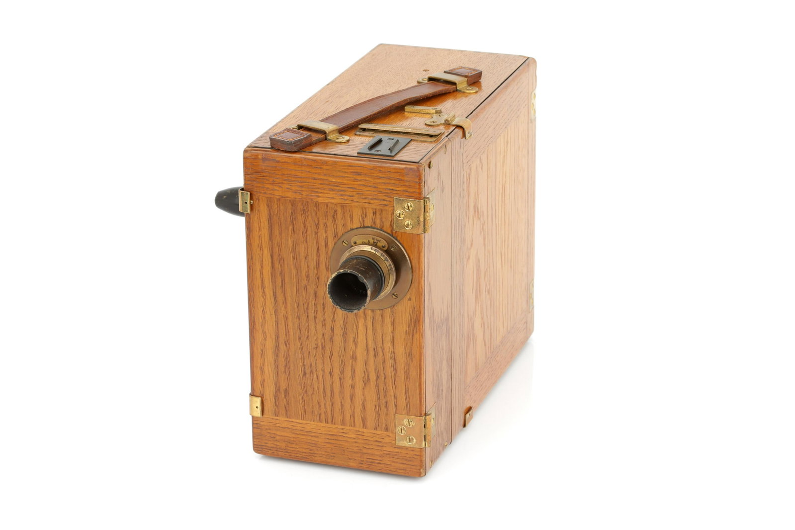 An Ernemann Kino C II Motion Picture Camera,: 1916, serial no. 906400, with f/3.5 lens, body, VG, mechanism working, slight nock to counter knob, lens, VG, in maker's case