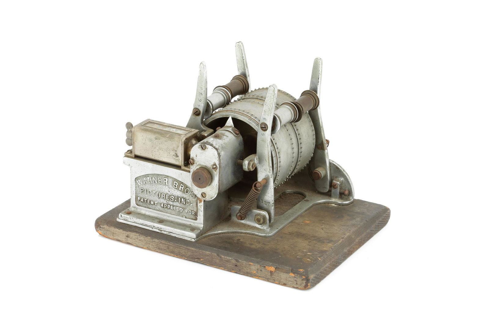 A Warner Bros Pictures inc. Film Synchroniser,: serial no. 127, for film editing, with four-digit counter, some damages to glass on counter