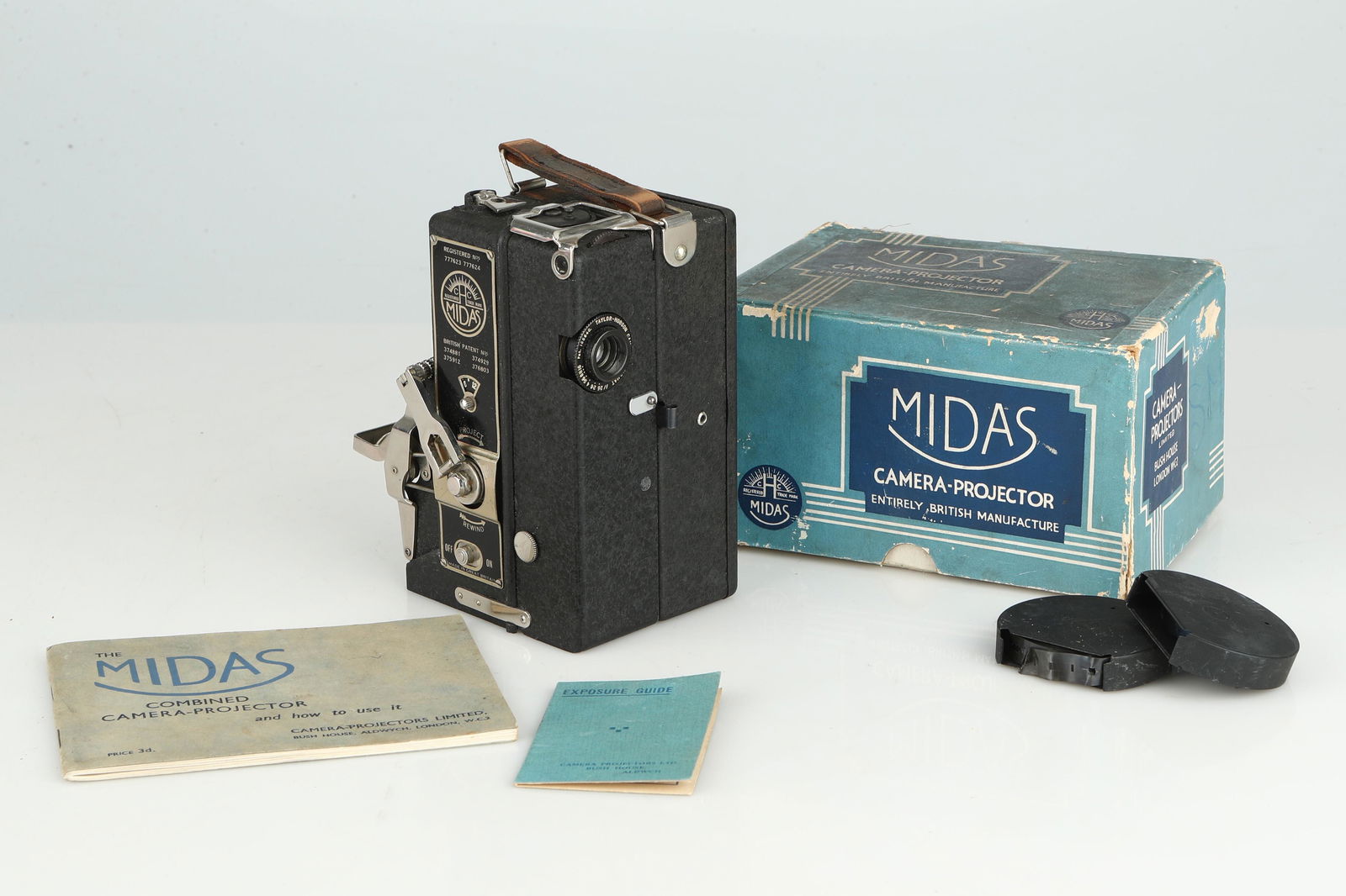 A Midas 9.5mm Combined Camera-Projector,: with a Taylor-Hobson Cam Anastigmat f/2.5 â€“ f16. One Midas reel full of exposed footage (from the 1930s) and one take up reel. Made in Great Britain. Original box. Untested. (Qty: 1)