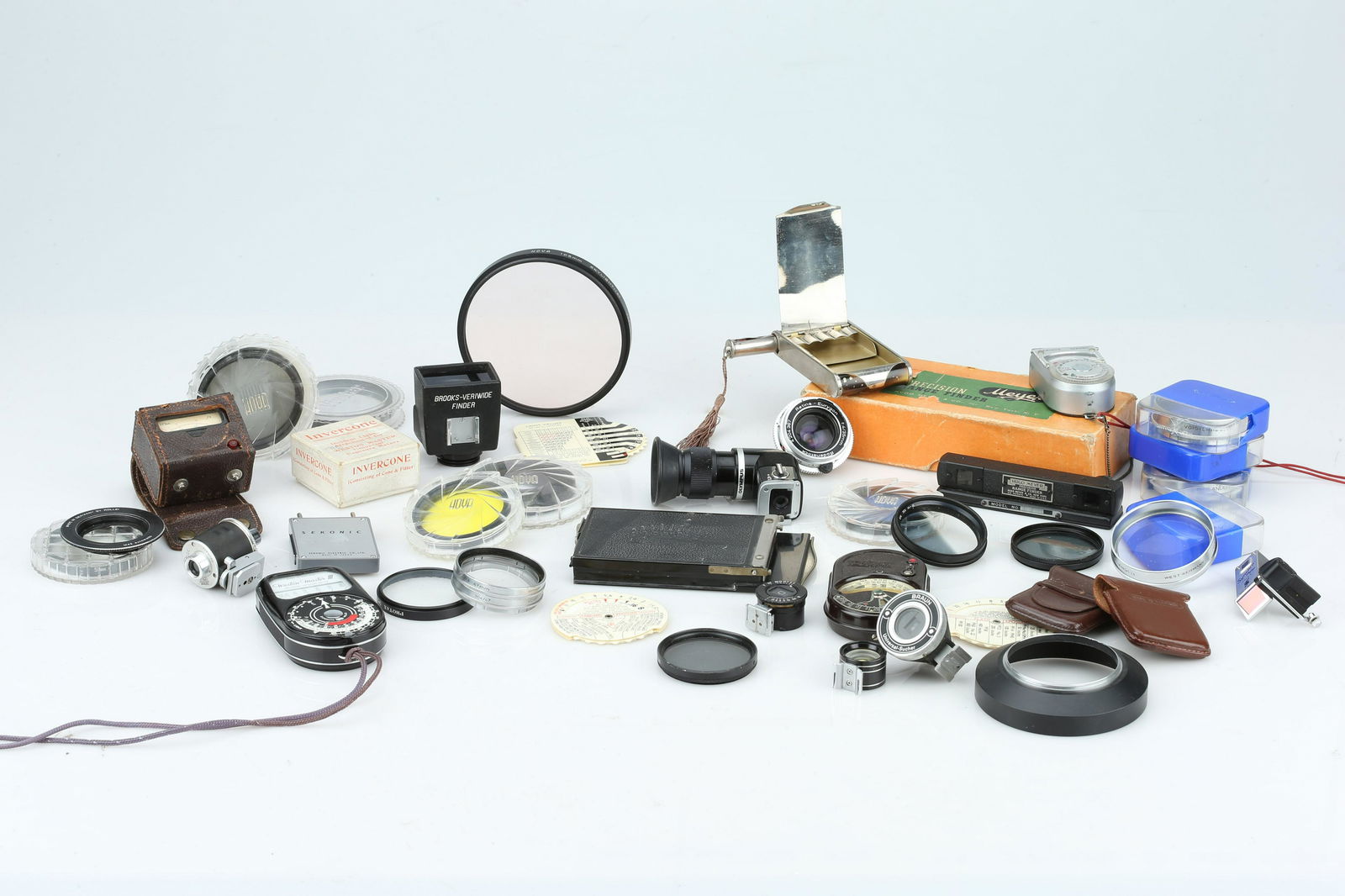 A Selection of Mixed Photographic Accessories,: from makers including Voigtlander, Hugo Meyer, Hoya, Hanimex, and more, (Qty: 1)