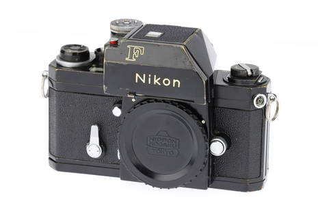 A Nikon F Photomic SLR Camera Body,: A Nikon F Photomic SLR Camera Body,black, serial no. 6751362, body, G, shutter working Note: Includes paperwork showing Serviced on the 28/07/2022 Provenance: This lot is John Robert Young collection