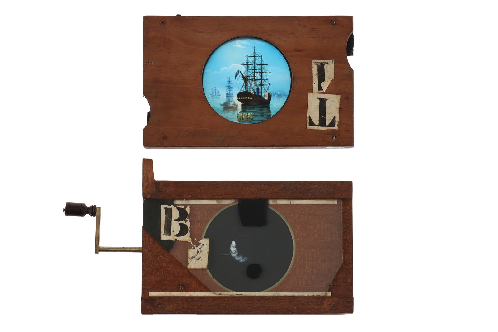 An Impressive Dissolving Set of a Victorian Steamer,: comprising of 2 slides, the first with a 3 masted steamer in port in the early evening, with pivoted control for small boat movement to both sides, the second slide with rackwork to control the smoke