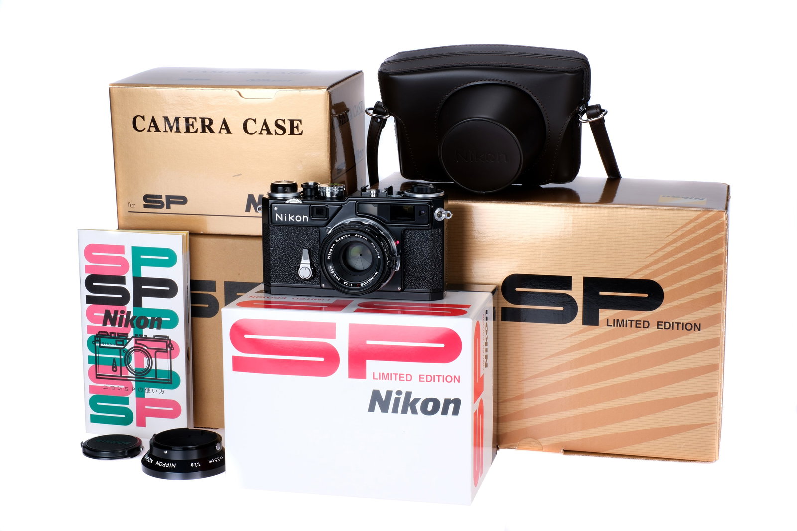 A Nikon SP Limited Edition Rangefinder Camera,: 2005, black, serial no. SP0720, with Nikon W-Nikkor.C f/1.8 35mm lens, black, serial no. 0720, body, E, shutter working, lens, VG-E, complete with original paperwork, case, and maker's boxes