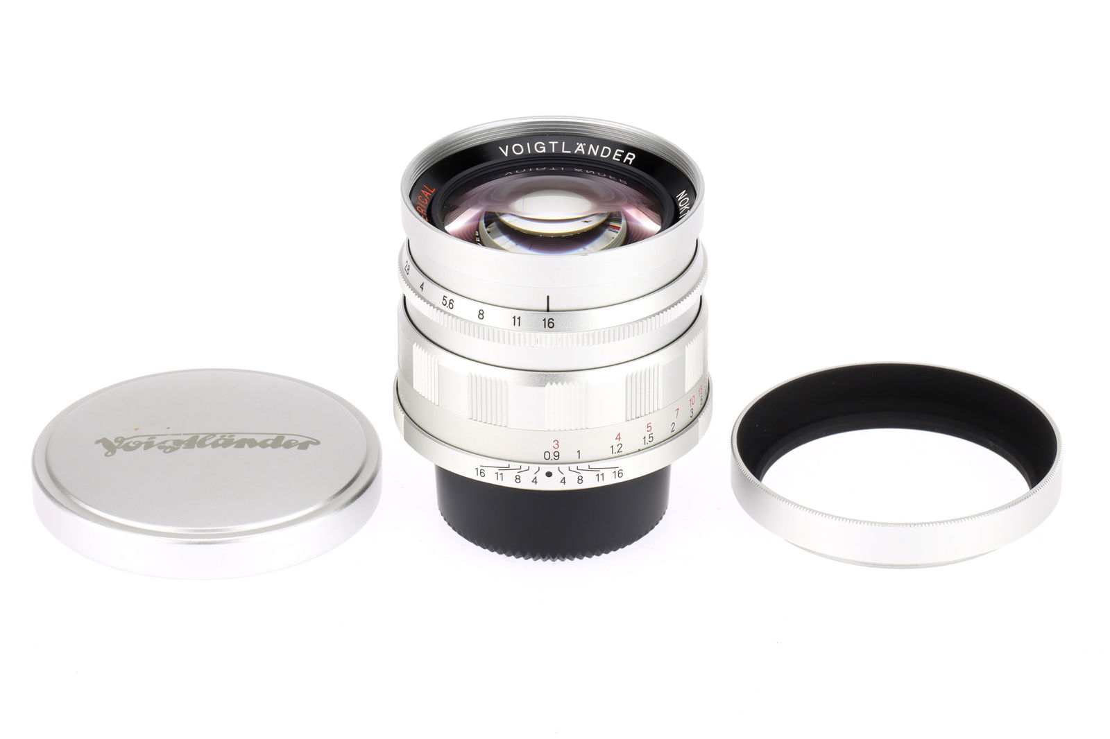 A Voigtlander Nokton Aspherical f/1.5 50mm Lens: chrome, Leica screw mount, serial 9950182, made in Japan, barrel VG-E, optics F-G with light haze to rear group, with hood and caps.