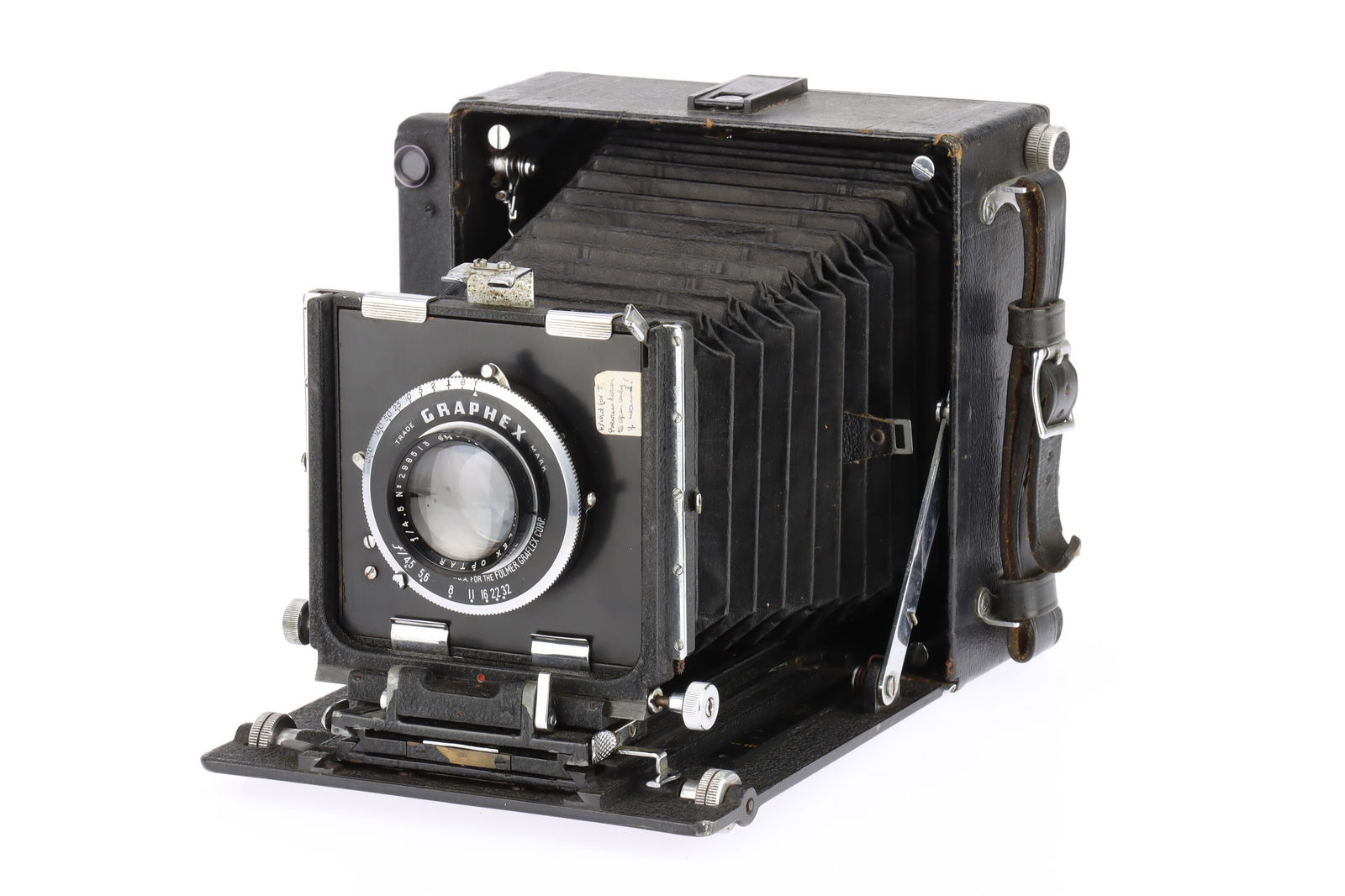 An MPP Micro Technical Large Format Camera: black, 1948-52, serial no.1752, possibly a Mark III, with a Graflex Optar f/4.5 6?in.lens, serial no.298513, shutter working, body G, lens P-F, overall haze