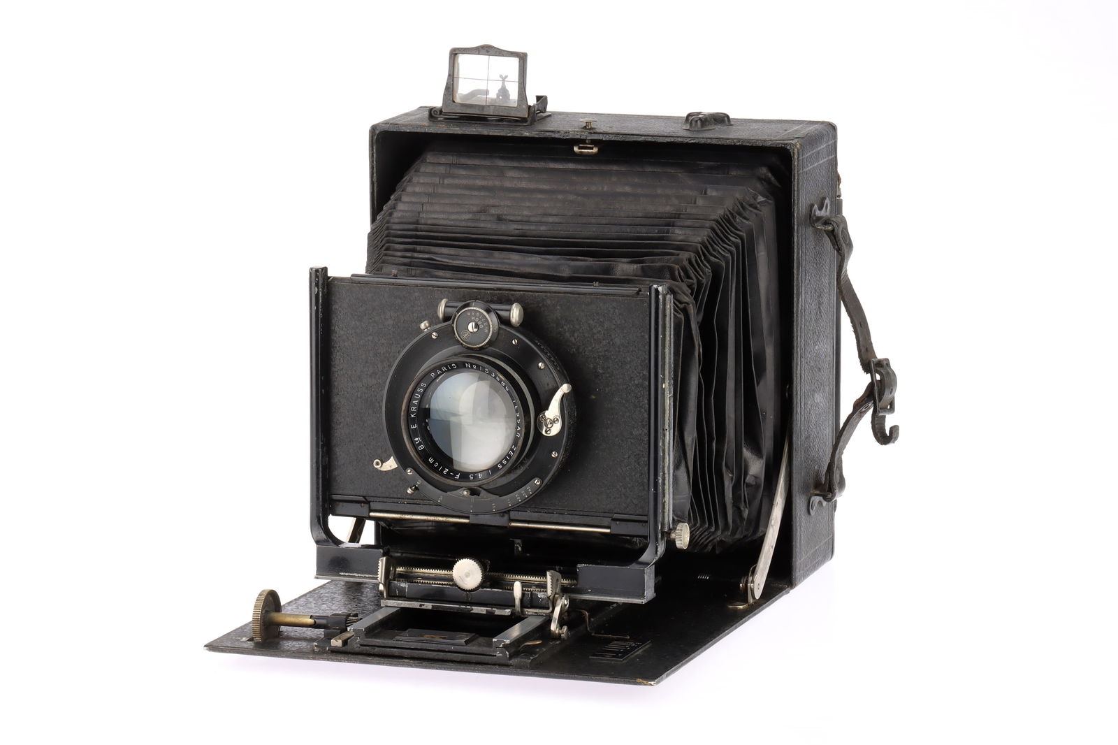 A Linhof Präzisionskamera 13x18cm Large Format Folding Camera: blaxk, 1910-1935, with an E.Krauss Paris Tessar Zeiss f/4.5 lens, serial no.153686, Compound shutter working, body G, front standard shift stuck, bellows kinked but appear light tight, lens F, overall