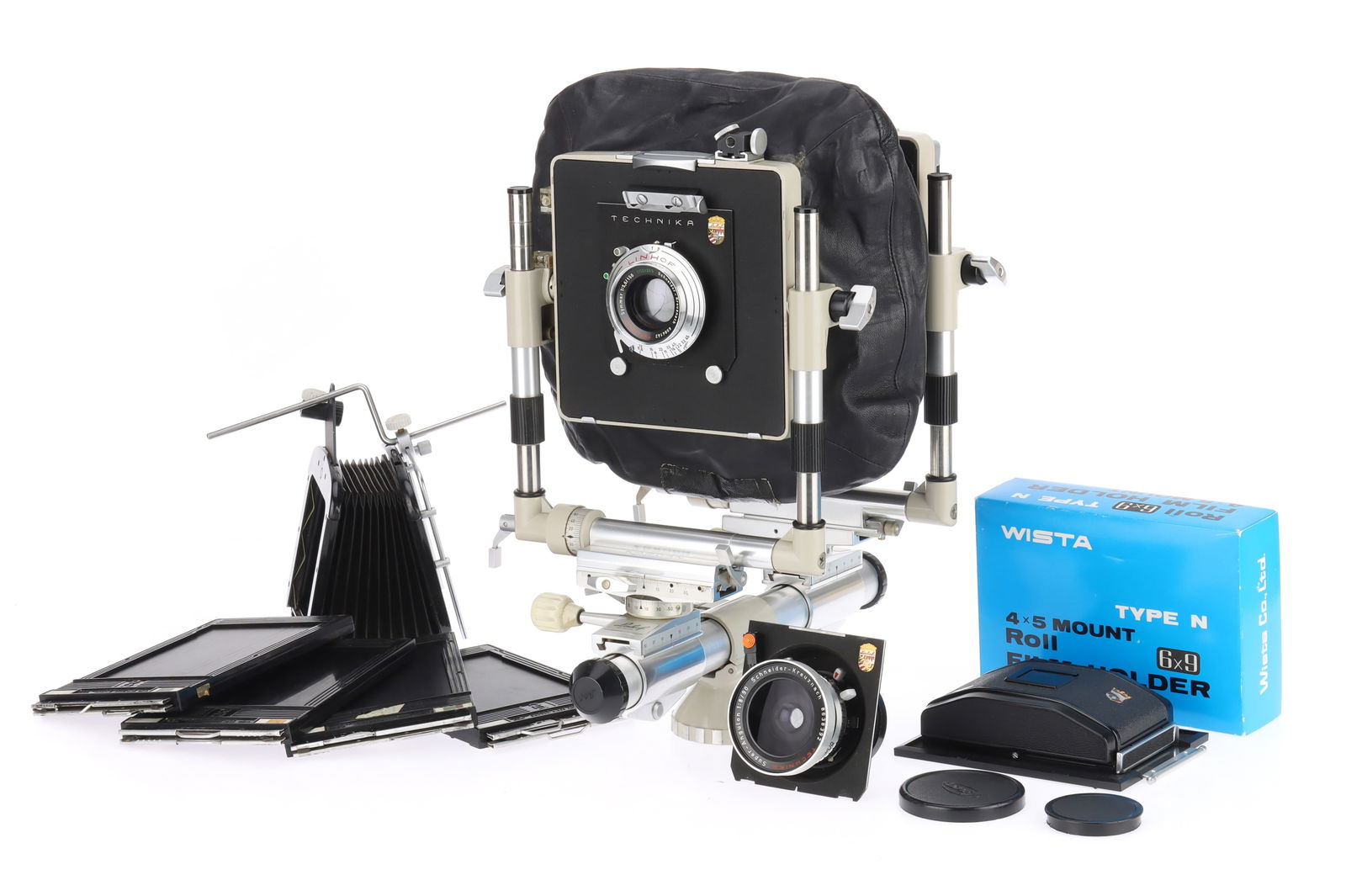 A Linhof Kardan Bi-System 4x5 Monorail Camera: silver, condition VG, appears lightly used, with Schneider-Kreuznach Technika Symmar f/5.6 150mm lens, barrel G, optics G, in a Linhof Shutter, working, a Schneider-Kreuznach Technika Super-Angulon f/