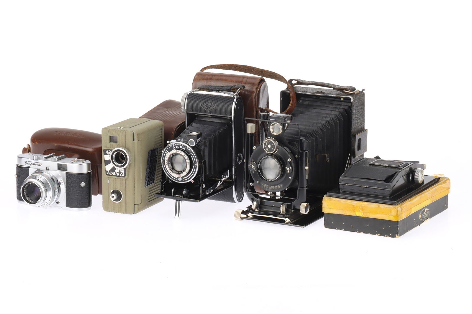 A Selection of Film Cameras,: comprising a Voigtlander Avus folding plate camera, bellows extends, not light tested, shutter works but sticks at slow speeds, with f/4.5 13.5cm lens, optics F-G, with 120 roll film back, an Agfa Bil