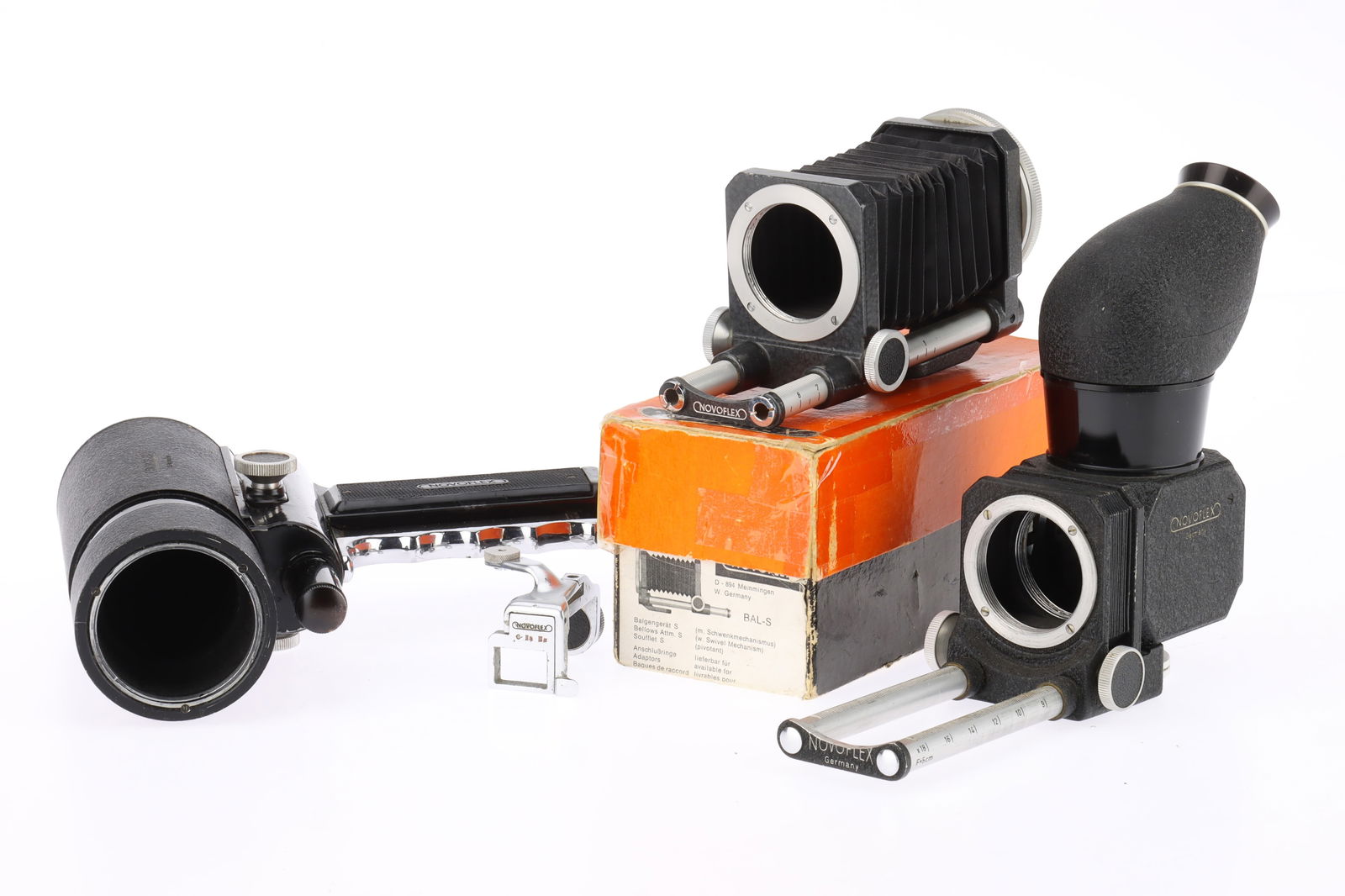 A Selection of Novoflex Accessories: A Selection of Novoflex Accessories comprising a 45 degree finder and bellows F-G, another bellows, untested, and a pistol grip F-G